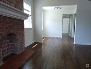 Building Photo - 1312 S Quaker Ave