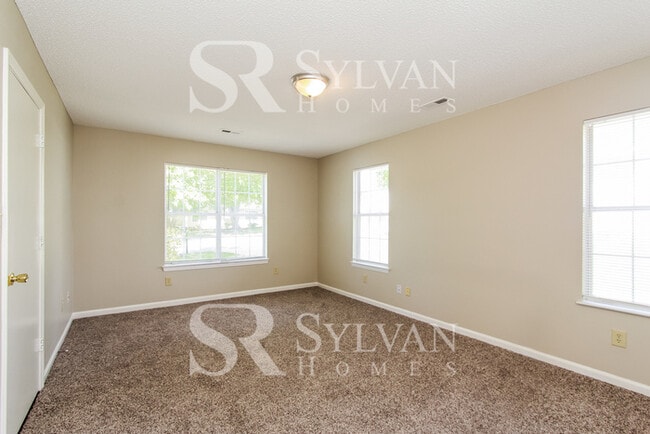 Building Photo - The living is easy in this 3 bedroom, 2 bathroom home