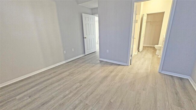 Building Photo - 9018 Lake Chase Island Way