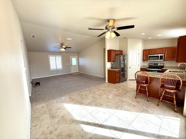 Building Photo - Great 4 Bedroom Home with Drive Through Side Gate!