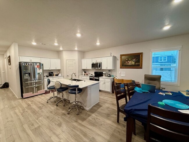 Building Photo - New Construction 4 Bed Mead School District Rancher w/ Fully-Fenced Yard and Attached Garage!