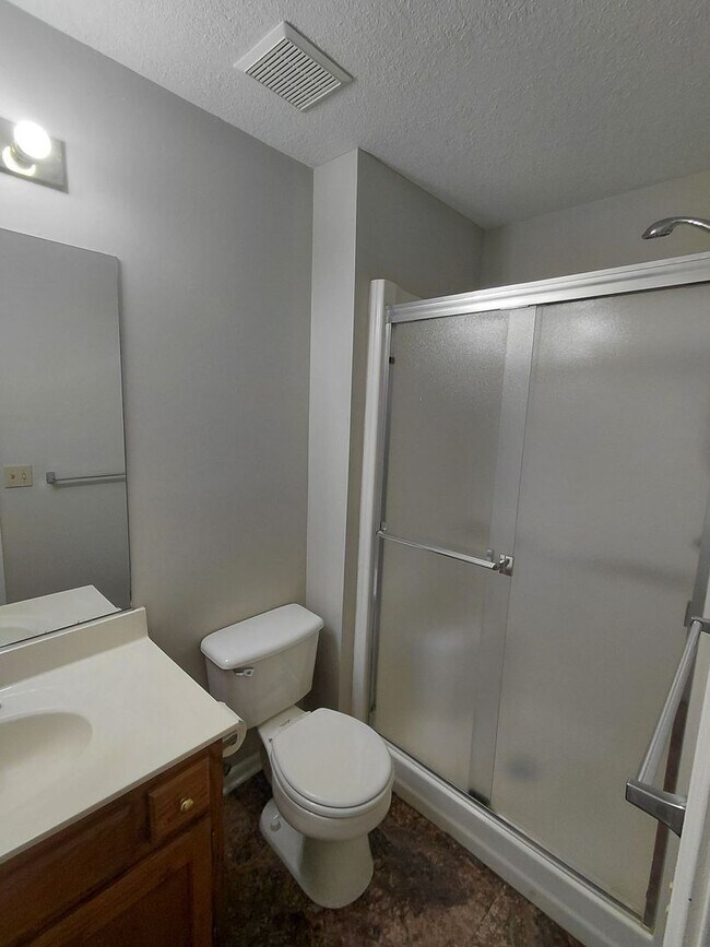 Building Photo - 3-Bedroom Duplex with Open Living Area & Private Owner’s Suite