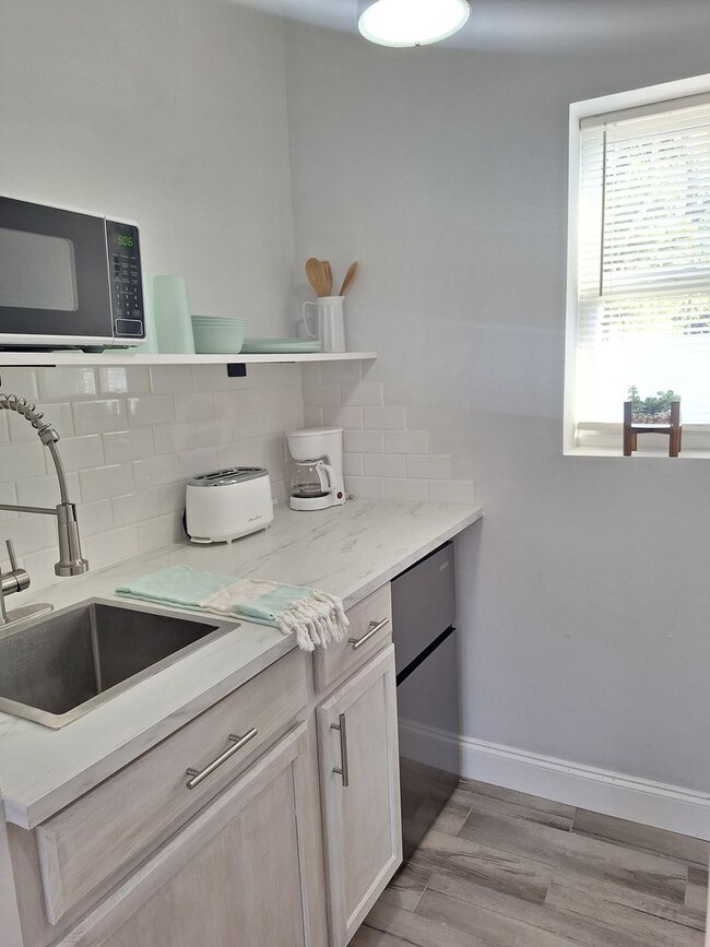 Building Photo - LONG TERM FURNISHED EFFICIENCY-ALL UTILITES INCLUDED!