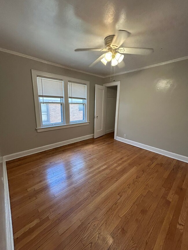 Building Photo - Charming 4-Bed Home with Fireplace & Hardw...