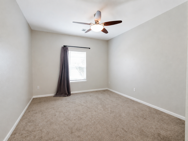 Building Photo - PRICE DROP!!  Spacious 2-Bedroom Condo with Garage, Fireplace, Pool & Most Included Utilities