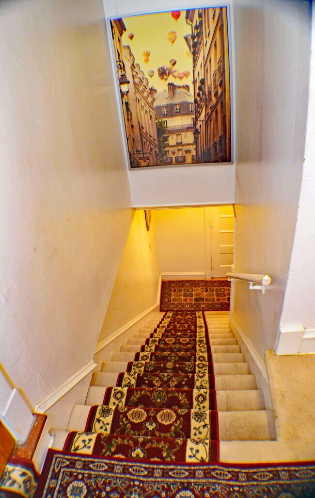 Staircase to Apartment - 1304 W 50th St