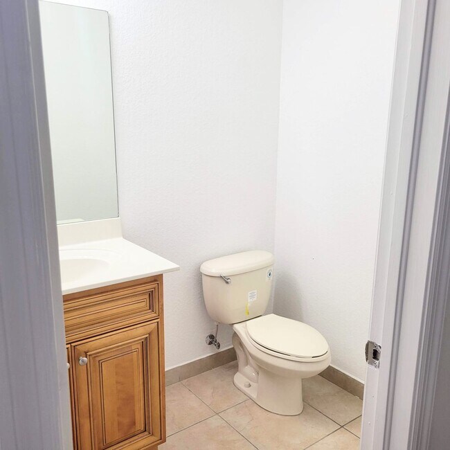 Building Photo - Single-story, 3/2.5 corner lot located near multiple FL Turnpike exits