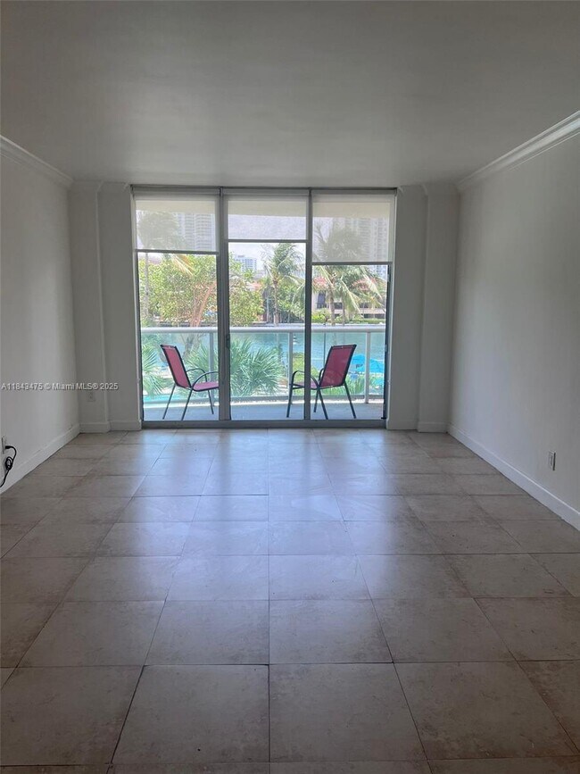 Building Photo - 19390 Collins Ave