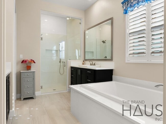 Building Photo - Rare 55+ Gated Travata Community – Bedrooms on Main + Loft + Resort-Style Amenities!