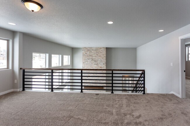 Building Photo - Exceptional 4-Bedroom Home with Dual Fireplaces, Main Level Master Suite, and Spacious Basement -...