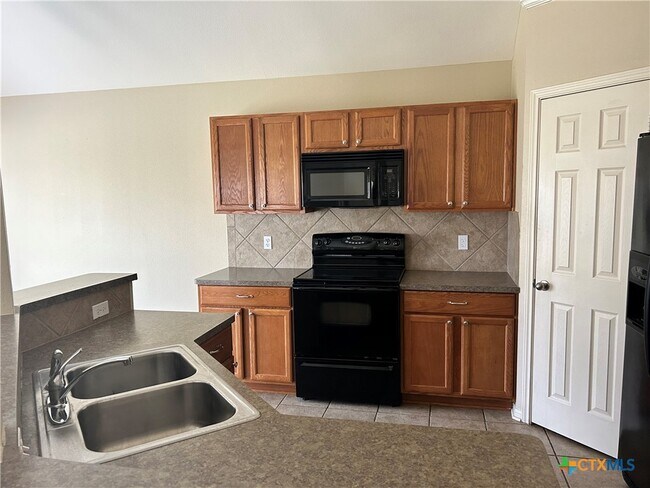 Building Photo - 5623 Fair Hill Dr