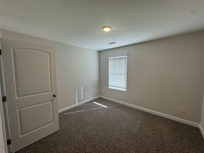 Building Photo - New Construction Community Home with 5 BEDROOMS!