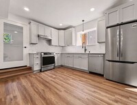 Building Photo - AVAILABLE MAY 1ST! Fully Remodeled Lower Unit with Private Entrance