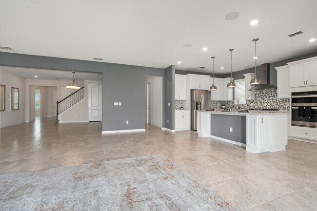 Building Photo - Immaculate Executive Home in Isles of Lake Nona