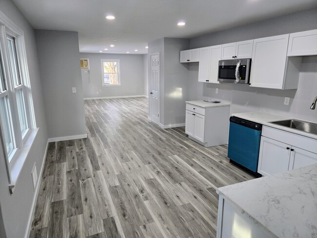 Eat-in Kitchen #2 toward Living Room - 151 Lilac Dr