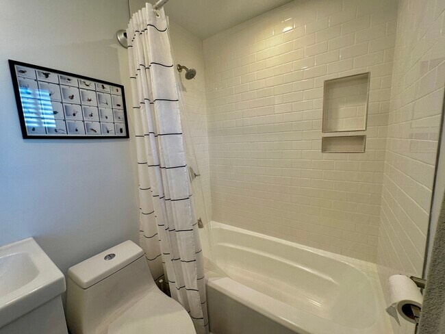 Bathtub and shower - 1743 S Orange Grove Ave