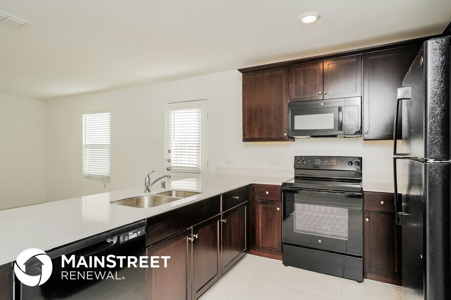 Building Photo - 5648 Rockrose Ln