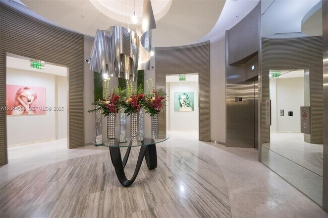Building Photo - 10275 Collins Ave