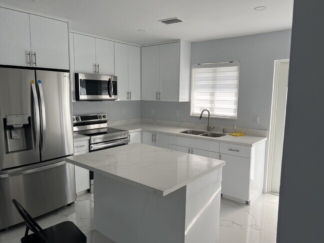 Building Photo - "Charming 2-Bed Retreat Waterfront W/Pool ...
