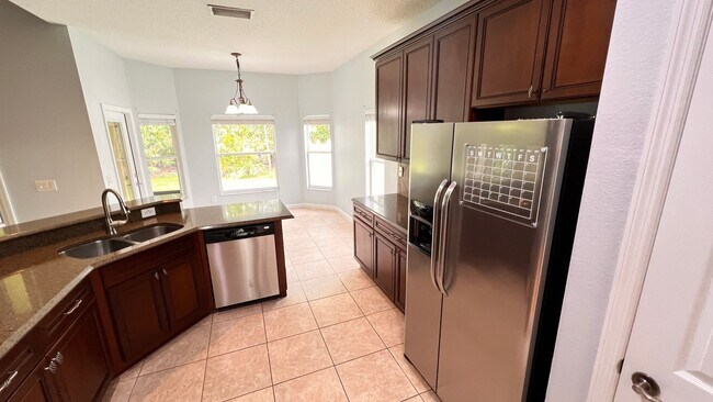 Building Photo - Available NOW! Stunning 4-Bedroom Home in ...