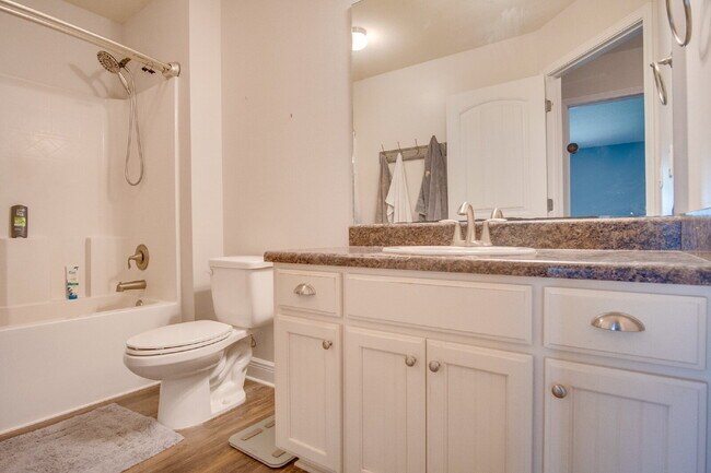 Building Photo - Milton 4BR Pool Home with Office, Vaulted Ceilings, Screened Saltwater Pool & 2-Car Garage