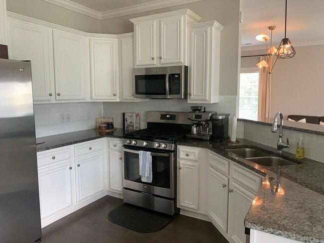Building Photo - Partially Furnished Lakefront Retreat in Sunset Bay – Stunning Views & Resort-Style Amenities