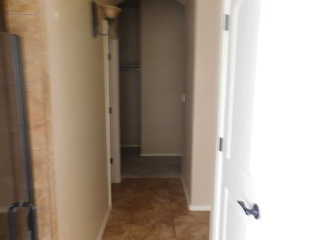 Building Photo - Beautiful 3 bedroom to bath house in the Sonoma Ranch Area.