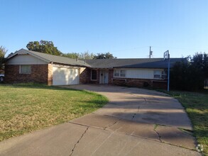 Building Photo - ACU AREA FOUR BEDROOM HOME