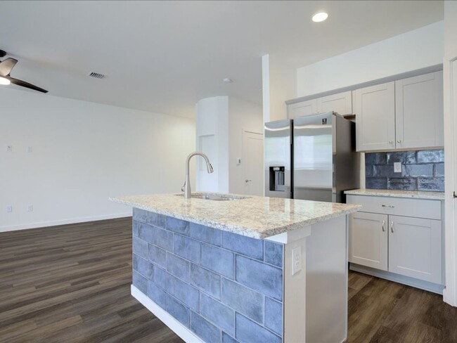 Building Photo - Stylish Two-Story Living with Modern Comforts!