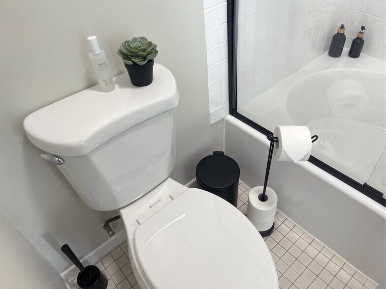 NEW toilets in both bathrooms - 9047 Langdon Ave