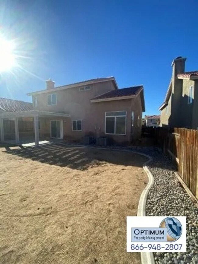 Building Photo - Spacious 4-Bedroom Home with 3-Car Garage ...