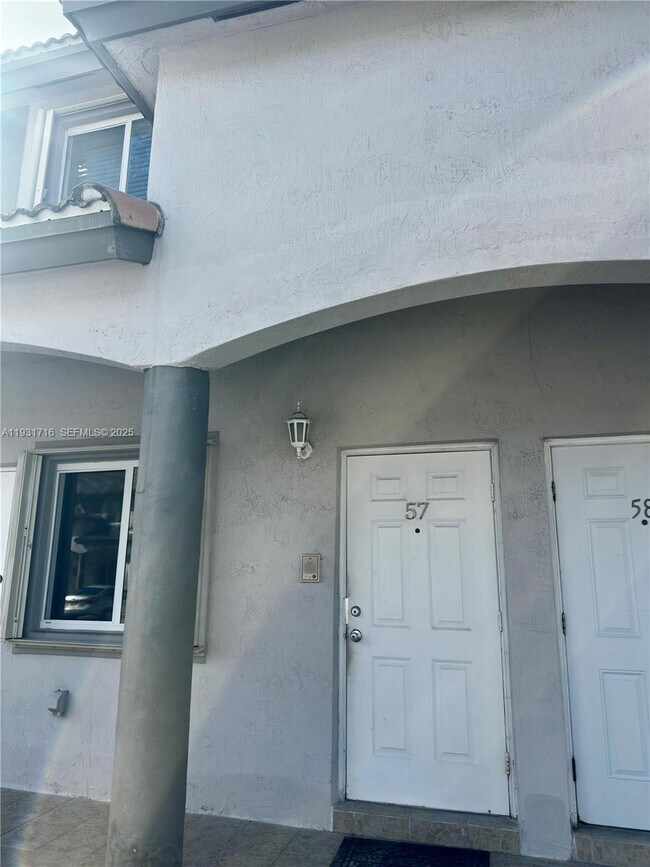 Building Photo - 5655 NW 109th Ave