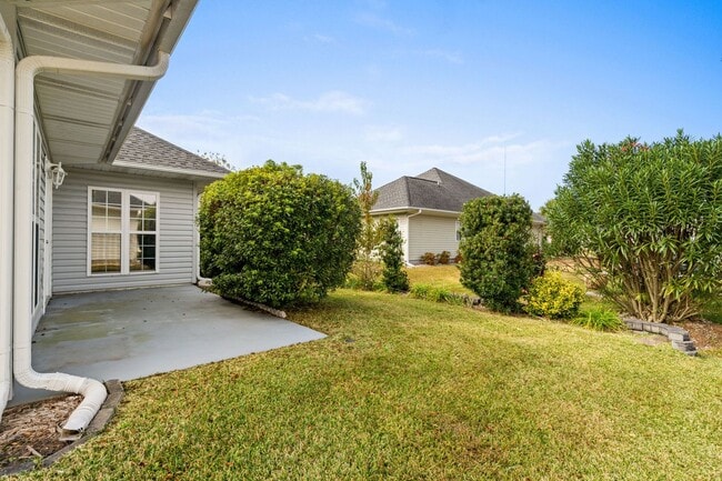 Building Photo - Live the Coastal Lifestyle in This Cypress Keys Beauty!