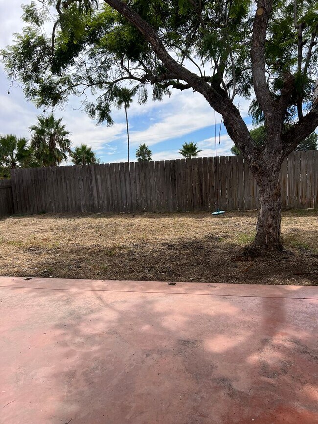 Building Photo - Updated 3BR/2BA home w/yard and garage in ...