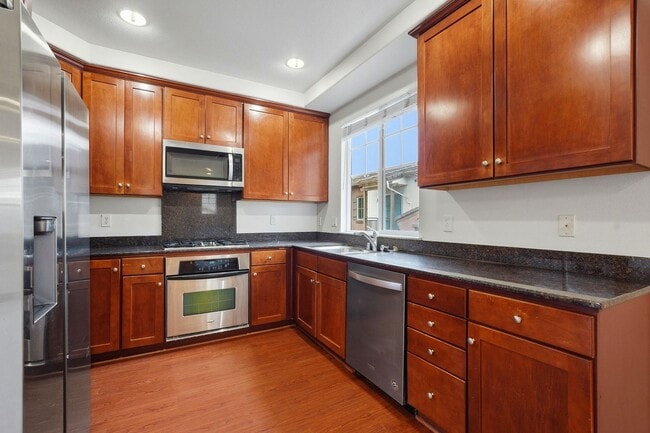 Building Photo - Spacious 2BR/2BA End-Unit Condo for rent in Warm Springs – Montebello Community