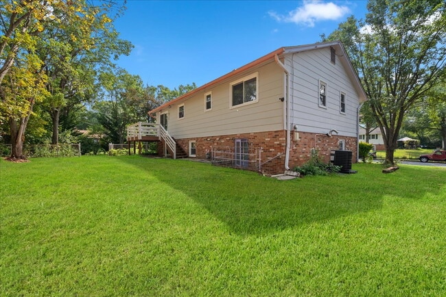 Building Photo - "Spacious 5-Bed Home with Granite Accents ...