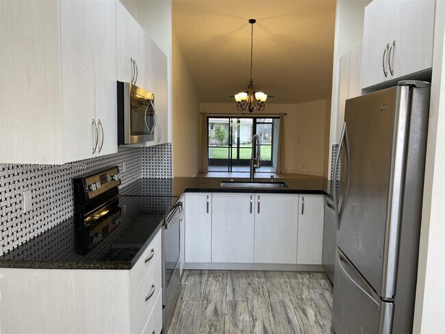 Building Photo - 16606 Greens Edge Cir