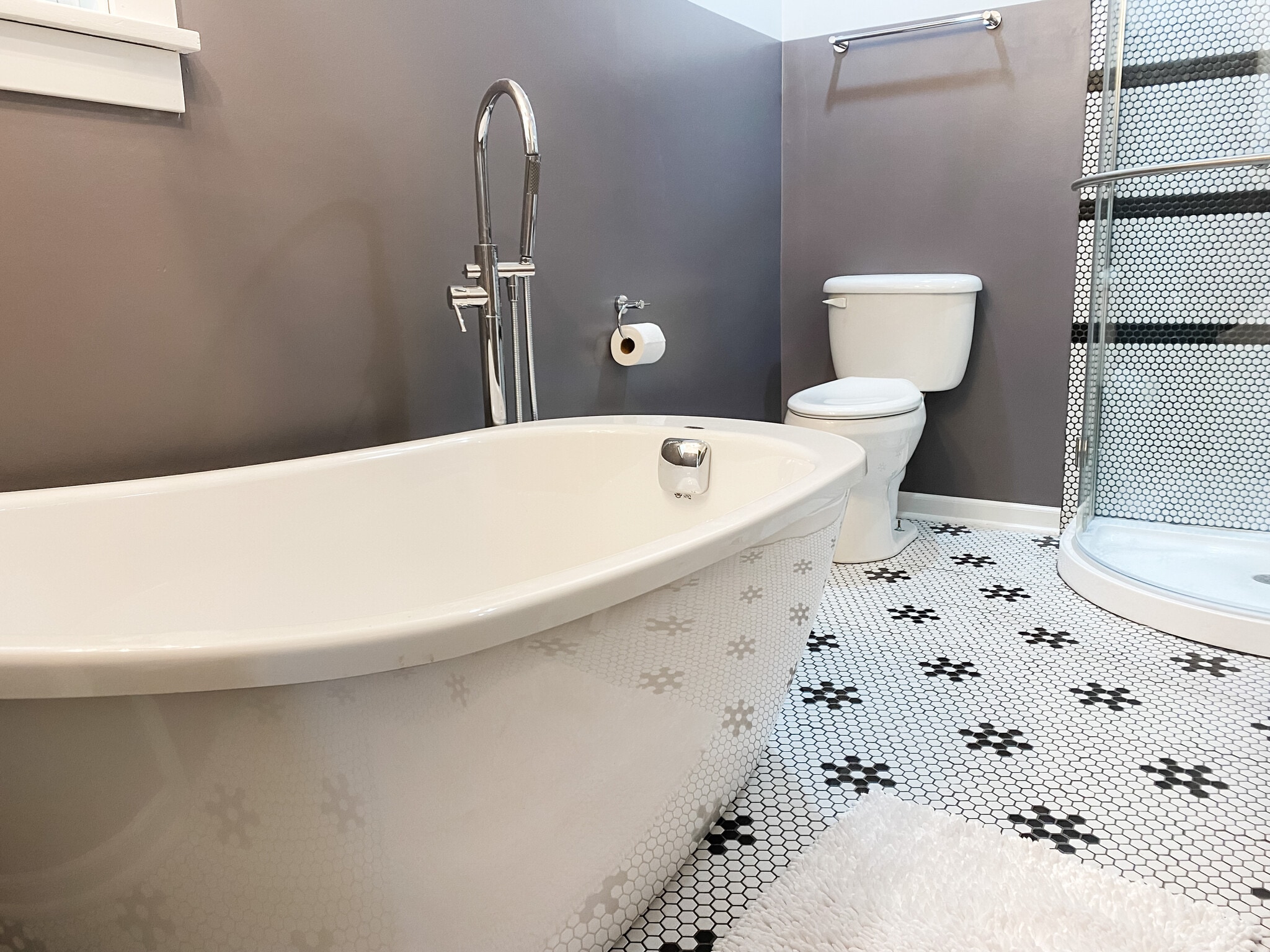 Freestanding tub with tiled floor and corner shower - 1012 Englewood Ave