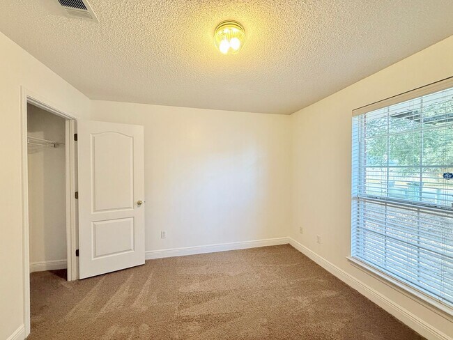 Building Photo - Spacious 4-Bedroom, All-Brick Home