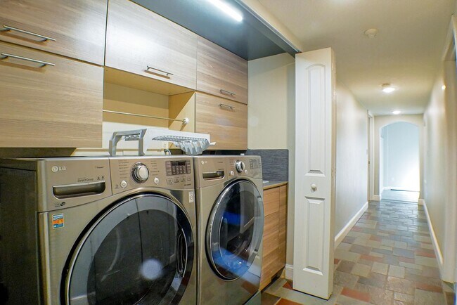 Building Photo - RARE ON MARKET , 2+den 2 1/2 bath overviewing a lake behind bell tower