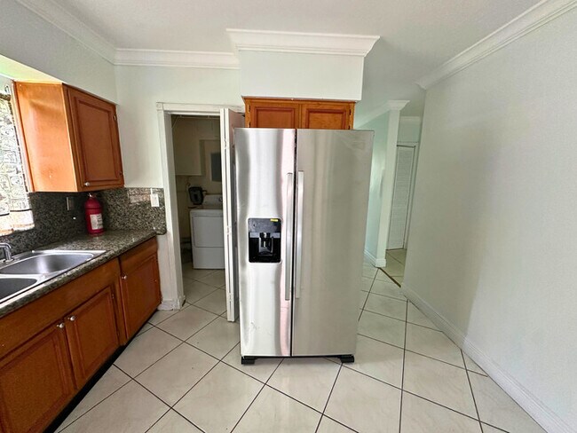 Building Photo - A charming home features 3 spacious bedroo...