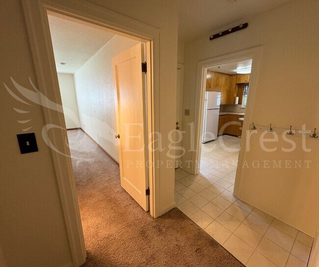 Building Photo - Three Bedroom, Two Bathroom House with Fenced Yard and Outdoor Fireplace