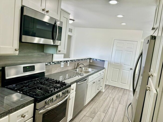 Building Photo - FANTASTIC 4BD 1&3/4BA HOUSE FOR LEASE ON CUL-DE-SAC!