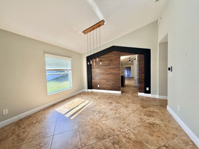 Building Photo - Modern Living Meets Prime Location with this Stunning 4/2!