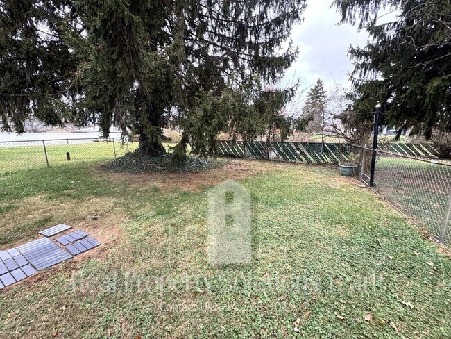 Building Photo - LOWER PRICE! $1500 - 2 bedroom home w/ fenced backyard