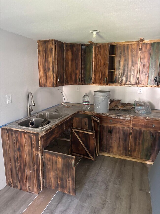 Building Photo - Perfect Home for You and Your Pup! Dog House Included + Fenced Yard