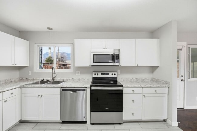 Building Photo - Updated 4BR Home with 2-Car Garage in Stratmoor