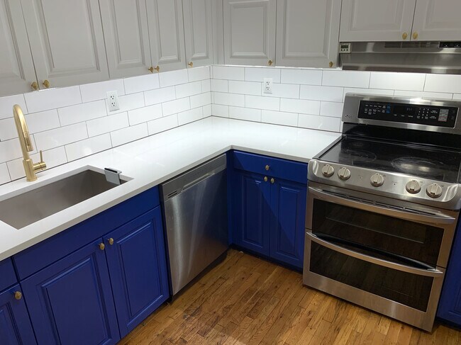 New touch activated faucet. Stainless steel dishwasher and double oven with convection. - 25 N Broadway