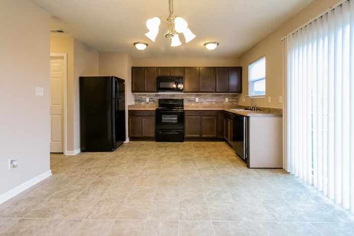 Building Photo - 8133 Whistlewood Dr
