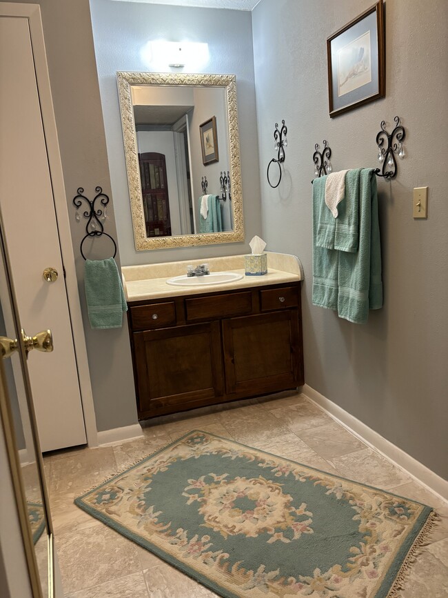 Separate basin and dressing area. - 3515 Sable Palm Ln